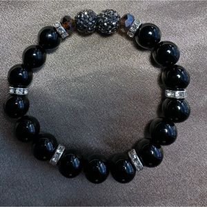 Black Onyx bracelet harmonious relationship, spiritual protection.